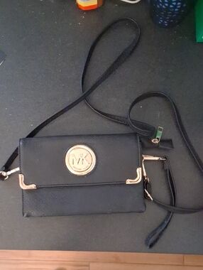 Michael Kors Black Crossbody Clutch with Gold Logo
